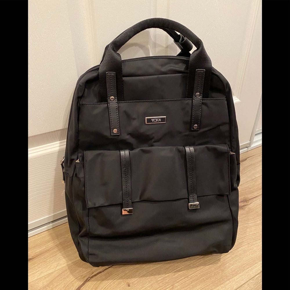 Tumi woman backpack like new